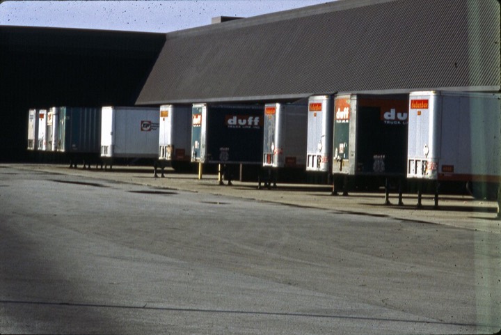 Trucks backed into a dock